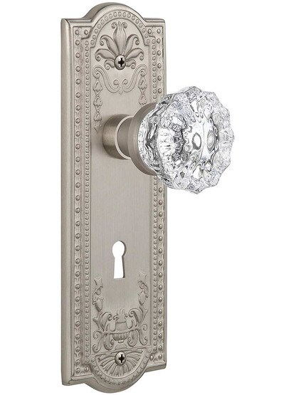 Meadows Door Set with Fluted-Crystal Glass Knobs and Keyhole Single Dummy in Satin Nickel.